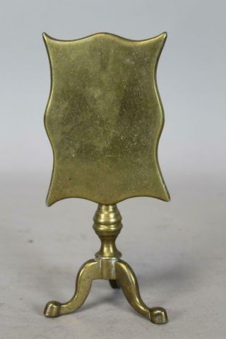 A RARE LATE 18TH C BRASS CANDLE REFLECTOR IN THE SHAPE OF A TILT TOP TEA TABLE 2