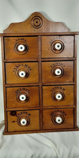 Antique Wood 8 Drawer Spice Chest With Porcelain Knobs.
