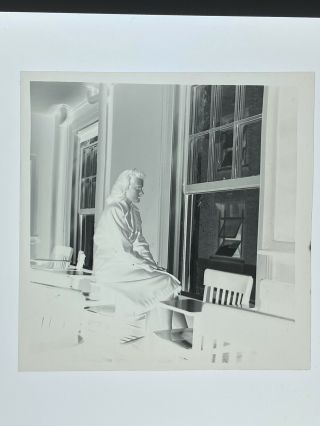 Vintage photo negative,  Girl,  Pensive pose by window,  sitting on desk 2