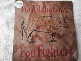 Foo Fighters.  For All The Cows.  Limited Edition 7 Inch Blue Vinyl.