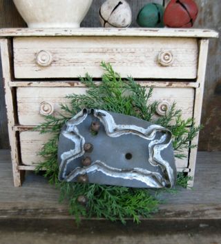Small Primitive Christmas Wreath With Antique Tin Running Horse Cookie Cutter