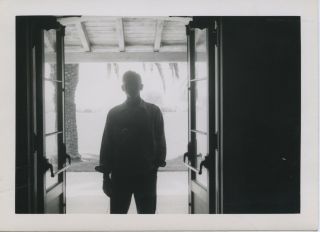 Vintage Photo.  Silhouette Of Man In Open Door.