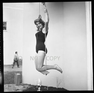 N412 1960 ' S NEGATIVES.  GORGEOUS SEXY LADY MODEL IN SWIMSUIT ON SWING,  IMAGES 3