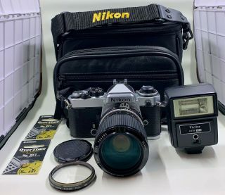 Vintage Nikon Fe Camera With Nikkor Zoom Lens,  Flash Unit,  And Camera Bag