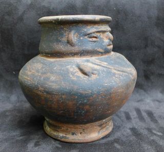 rare pottery vessel with a human face and necklace,  Tairona cult.  Columbia 2