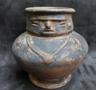 rare pottery vessel with a human face and necklace,  Tairona cult.  Columbia 5