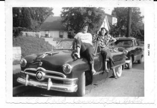 Teen Girls Sitting On 1950 