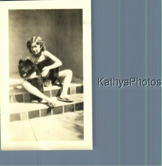 Found B&w Photo K_8065 Woman Sitting On Step With Black Dog Blurry