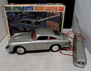 Vintage Tin Battery - Op M101 Aston Martin Secret Ejector Car,  Daiya,  Japan.  Afib