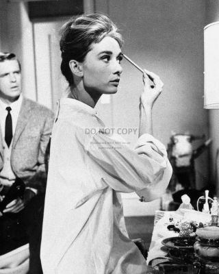 Audrey Hepburn And George Peppard In " Breakfast At Tiffany 
