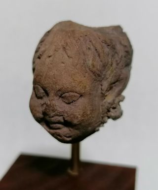 A Roman - Egyptian Terracotta Head Of A Cherub - 2000 Years Old