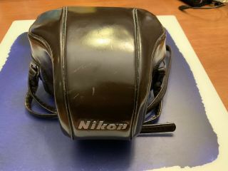 Vintage Nikon F Camera With 50 Mm Lens And Cover