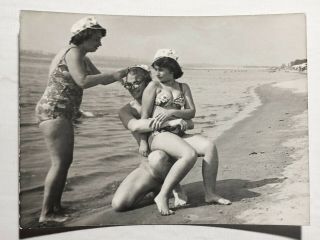 1960s Two Sexy Women Sitting in the arms of man Black Sea Swimsuit vintage Photo 2