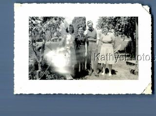 Found B&w Photo F,  6599 Man Posed With Pretty Women In Dresses,  Light Anomaly