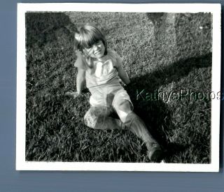 Black & White Photo J_6076 Little Girl Sitting Back On Grass