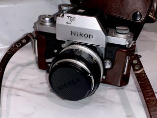 Vintage Nikon F Camera With Nikkor S Auto 1:14 F= 50 Mm Lens And Leather Cover
