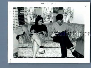 Found B&w Photo F,  5860 Man And Woman Sitting On Couch Reading Books