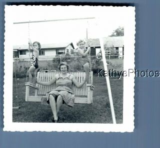 B&w Photo F,  2589 Woman Sitting On Swing,  Girls,  Swimsuits