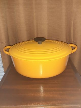 A Rare Yellow Vintage Le Creuset Enameled Cast Iron Oval Dutch Oven 5.  5 Qt
