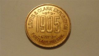 1905 Lewis & Clark Exposition,  Portland,  Oregon Wonder Millinery Merchant Token