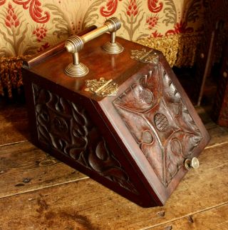 An Attractive Carved Wood And Brass Coal Bin,  Slipper Box,  Kindling Store
