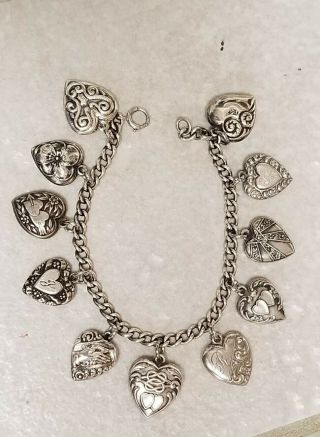 Vtg Sterling Silver Repousse Puffy Heart Charm Bracelet 11 Charms 22.  89 Grams
