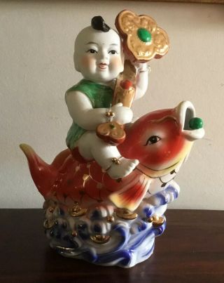 Vintage/antique Ceramic/porcelain Chinese Figurine Boy On Koi Fish