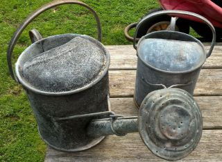 Two Vintage Small Galvanised Watering Cans