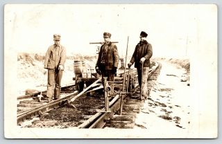 Real Photo Postcard Railroad Workers Switch Tracks Pick Axe Hand Car C1908 Rppc