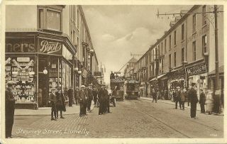 Llanelly Stepney Street Boots Shop Two Trams Passing Tango Tea And J Marker Adv