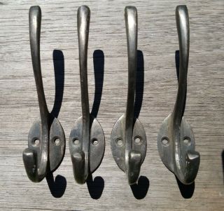 4 Solid Antique Pewter Brass Double Coat Hooks W.  Oval Backplate 4.  5 " Long 4
