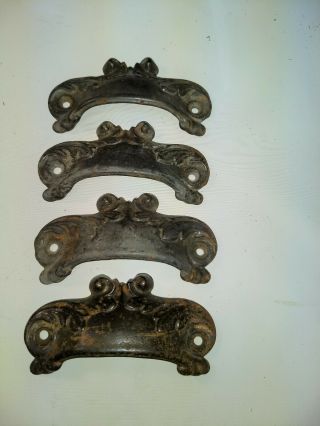 4 Antique Cast Iron Bin Pulls In Very Good