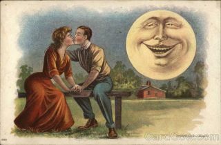 Couple 1910 A Young Man And Woman Kiss On A Park Bench By The Light Of A Grinnin