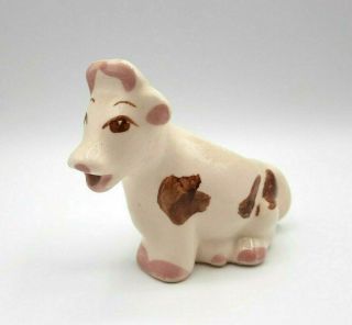 Vintage Pottery Sitting White And Brown Cow Creamer