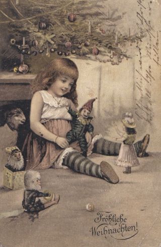 Girl Sits Under Christmas Tree.  With Jester Doll & Toys