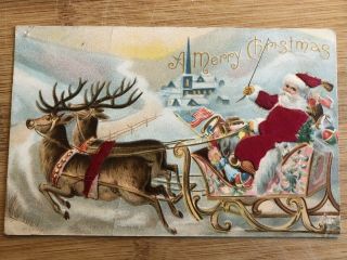 Antique Merry Christmas Postcard With Santa Claus Sleigh Reindeer Embossed 1900s