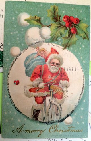 Santa Claus Riding A Bicycle,  Father Christmas,  Glittery Post Card 1906