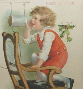 Antique Vintage Happy Year Child Talking To Tin Can Radio Station Postcard