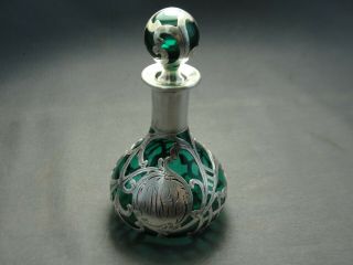 Antique Art Nouveau Green Glass Perfume Genie Bottle.  999 Silver Overlay 4 1/2 " H