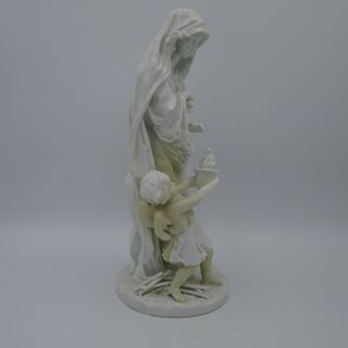 An Antique Meissen Porcelain Woman & Cherub Figurine.  Made In Germany.  C1800