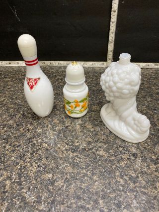 Three Vintage Avon Milk Glass Perfume Bottles.