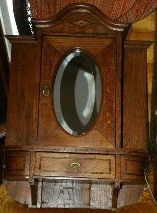 Antique Wood Medicine Cabinet/Apothecary w/oval mirror,  shelves 5