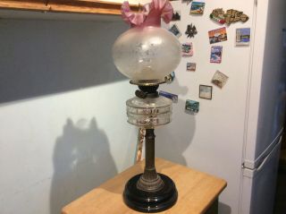 Antique Oil Lamp And Cranberry Glass Shade