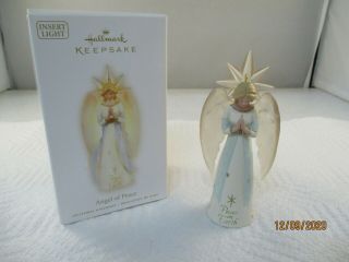 Hallmark Keepsake Ornaments 2009 Angel Of Peace Insert Light Ornament