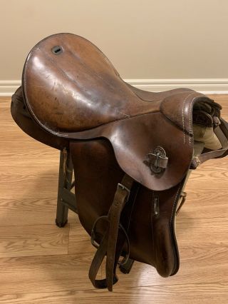 Vintage English Brown Leather Riding Saddle With Metal Stirrups,