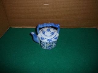 Three Hands Corp.  Tiny White W/ Blue Flowers Tea Pot
