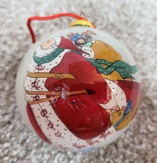 Li Bien – Reverse Hand Painted Glass Ornament – Santa Flying