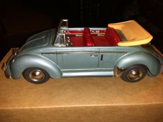 Vintage Worldwide Tin Volkswagen Convertible Batt operated,  lited,  piston action 2