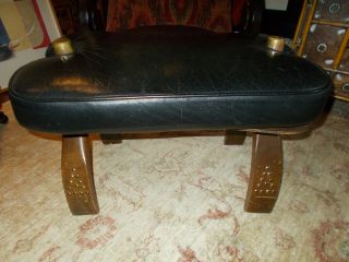 1950s Vintage Moroccan Camel saddle with leather upholstery.  ottoman 2
