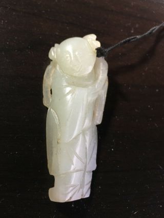 A Chinese Hetian White Jade Figure Of A Boy